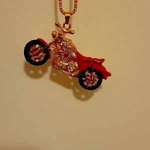 Betsy Johnson red motorcycle pendant